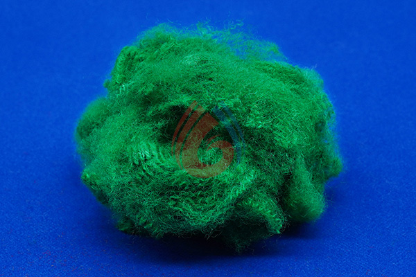 PET staple fibers for high tenacity geotextile